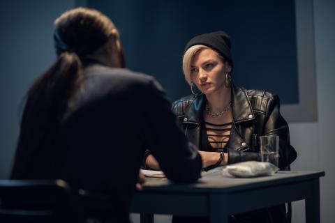 A photo of someone in a police interview room